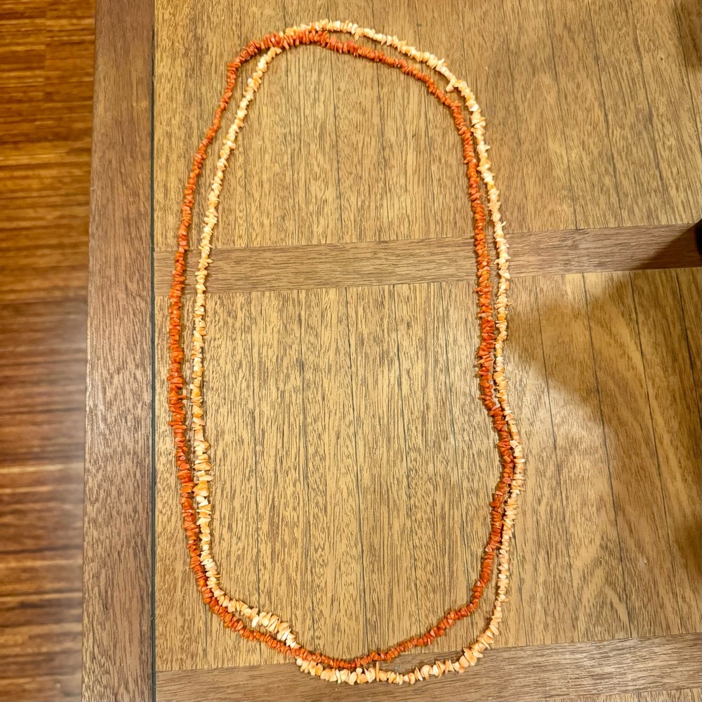 Two strings of Vintage coral beads (one light one dark) 34” long each EUC